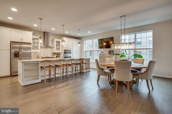 Dining room, Interior, Kitchen, Pendant Lights, Recessed Lighting, Stainless Steel Appliances, Wood Texture Flooring