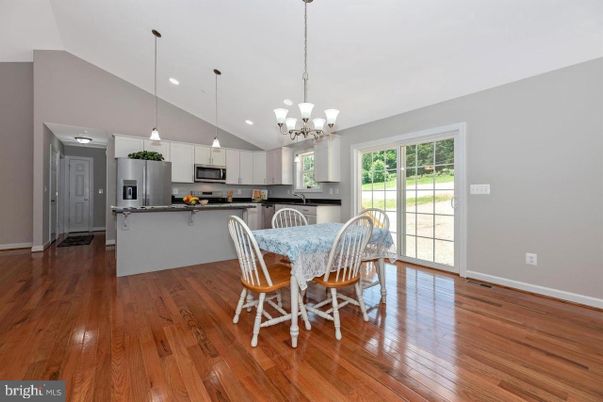 Chandelier, Interior, Kitchen, Pendant Lights, Recessed Lighting, Stainless Steel Appliances, Wood Texture Flooring