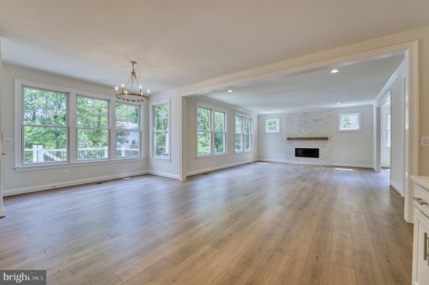 Chandelier, Empty room, Fireplace, Interior, Recessed Lighting, Wood Texture Flooring