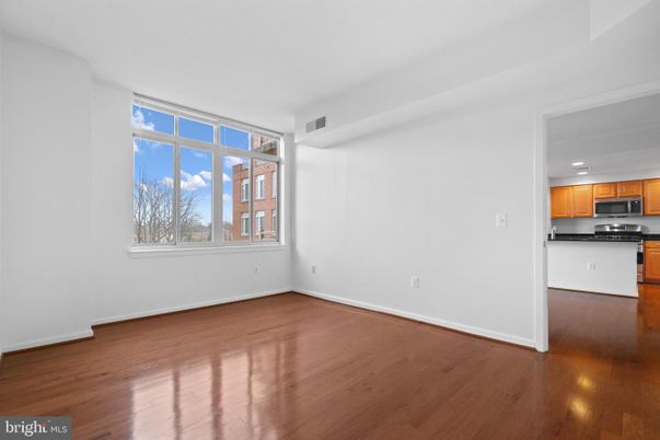 Empty room, Interior, Kitchen, Stainless Steel Appliances, Wood Texture Flooring