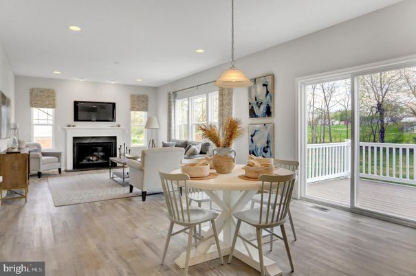 Dining room, Fireplace, Interior, Living room, Pendant Lights, Recessed Lighting, Wood Texture Flooring
