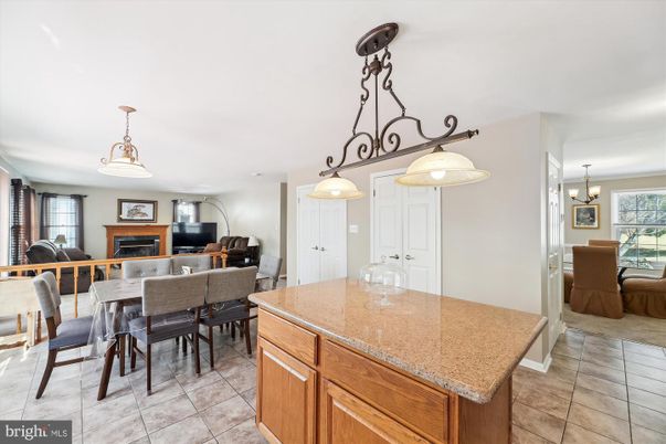 Chandelier, Dining room, Fireplace, Interior, Kitchen, Living room, Pendant Lights