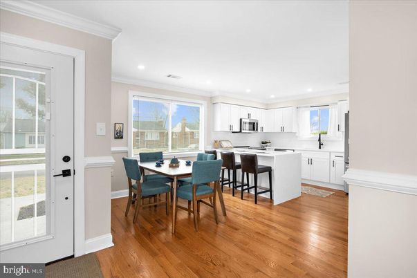 Dining room, Interior, Kitchen, Recessed Lighting, Stainless Steel Appliances, Wood Texture Flooring