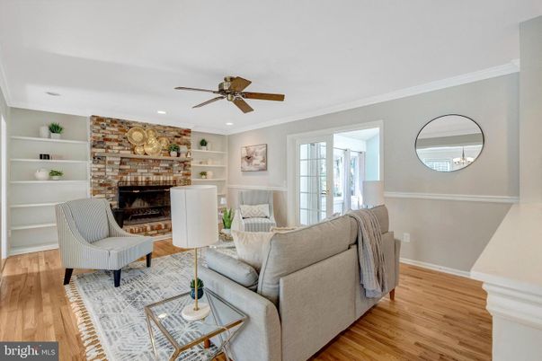Fireplace, Interior, Living room, Recessed Lighting, Stone Walls, Wood Texture Flooring