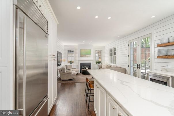Fireplace, Interior, Kitchen, Living room, Recessed Lighting, Stainless Steel Appliances, Wood Texture Flooring