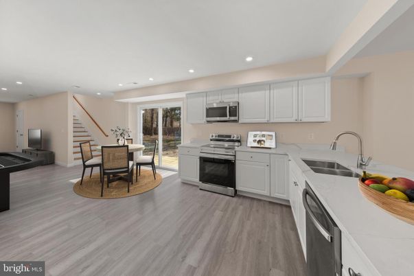 Dining room, Interior, Kitchen, Recessed Lighting, Stainless Steel Appliances, Wood Texture Flooring