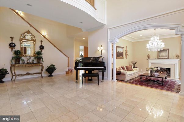 Chandelier, Fireplace, Interior, Living room, Piano, Recessed Lighting