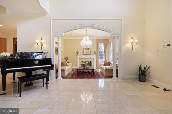 Chandelier, Fireplace, Interior, Living room, Piano, Recessed Lighting