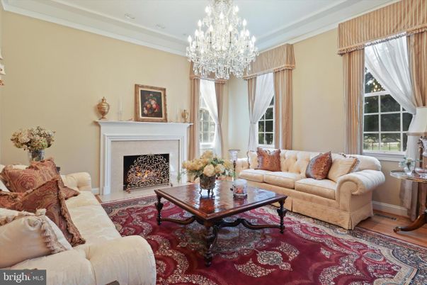 Chandelier, Fireplace, Interior, Living room, Recessed Lighting, Wood Texture Flooring