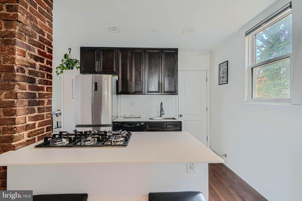 Interior, Kitchen, Recessed Lighting, Stone Walls, Wood Texture Flooring