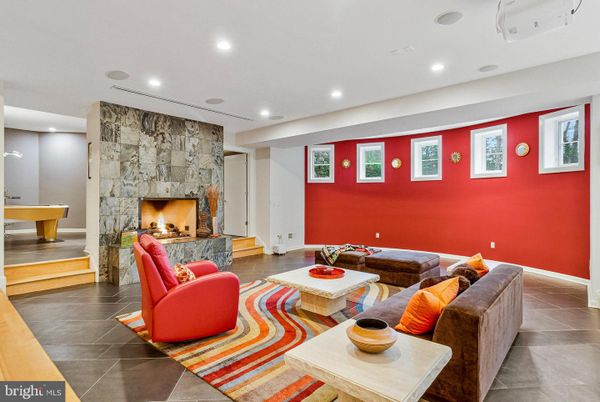 Fireplace, Game Room, Interior, Living room, Recessed Lighting, Stone Walls