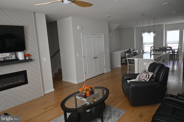 Dining room, Fireplace, Interior, Pendant Lights, Recessed Lighting, Wood Texture Flooring