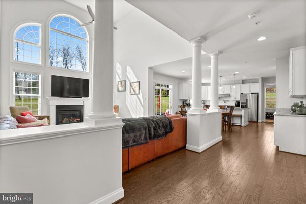Fireplace, Interior, Kitchen, Pendant Lights, Recessed Lighting, Stainless Steel Appliances, Wood Texture Flooring