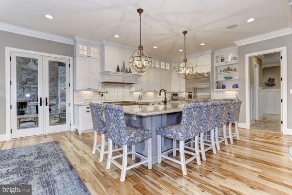 Chandelier, Interior, Kitchen, Pendant Lights, Recessed Lighting, Stainless Steel Appliances, Wood Texture Flooring