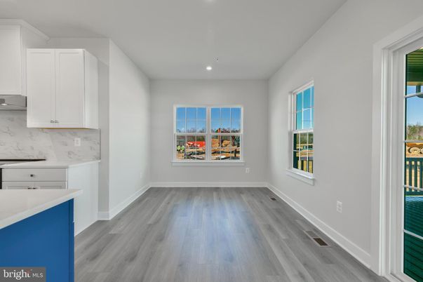 Empty room, Interior, Kitchen, Marble Walls, Recessed Lighting, Wood Texture Flooring