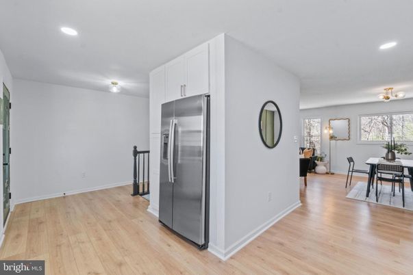 Dining room, Interior, Kitchen, Recessed Lighting, Stainless Steel Appliances, Wood Texture Flooring