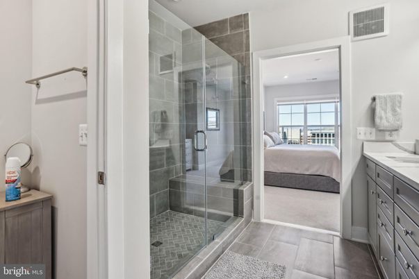 Bathroom, Bedroom, Glass Shower, Interior, Recessed Lighting, Wood Texture Flooring