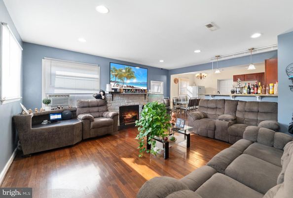 Dining room, Fireplace, Interior, Kitchen, Living room, Pendant Lights, Recessed Lighting, Wood Texture Flooring