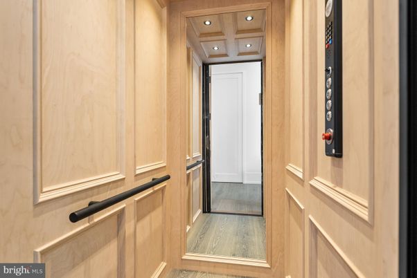Elevator, Interior, Recessed Lighting, Wooden Ceilings, Wood Texture Flooring, Wooden Walls