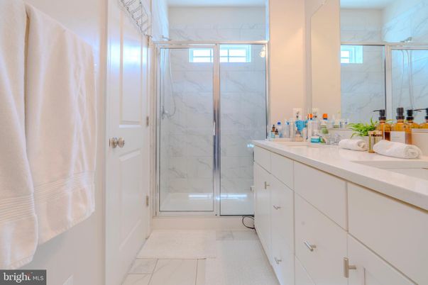 Bathroom, Dual Sink Vanities, Glass Shower, Interior, Marble, Marble Walls