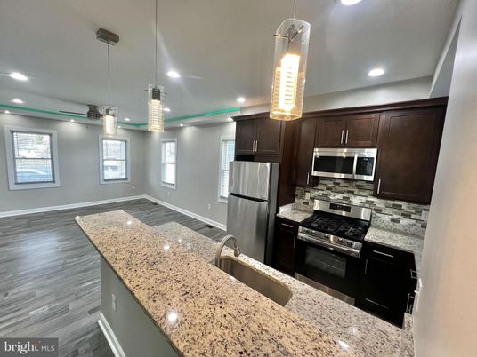 Interior, Kitchen, Pendant Lights, Recessed Lighting, Stainless Steel Appliances, Wood Texture Flooring