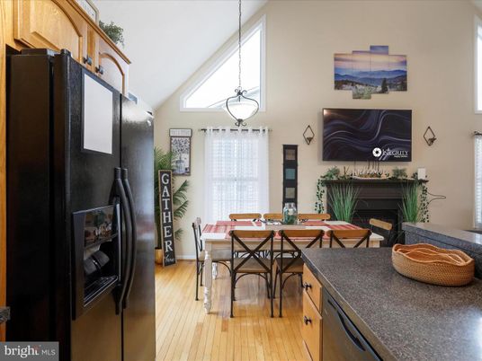 Dining room, Fireplace, Interior, Pendant Lights, Wood Texture Flooring