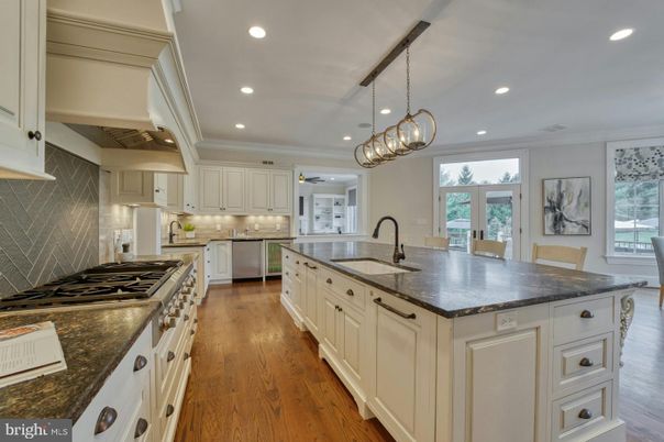 Chandelier, Interior, Kitchen, Pendant Lights, Recessed Lighting, Stainless Steel Appliances, Wood Texture Flooring