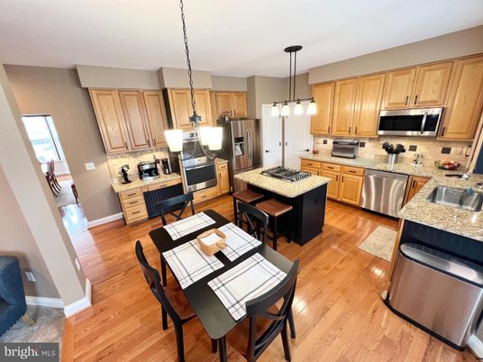 Dining room, Interior, Kitchen, Pendant Lights, Stainless Steel Appliances, Wood Texture Flooring