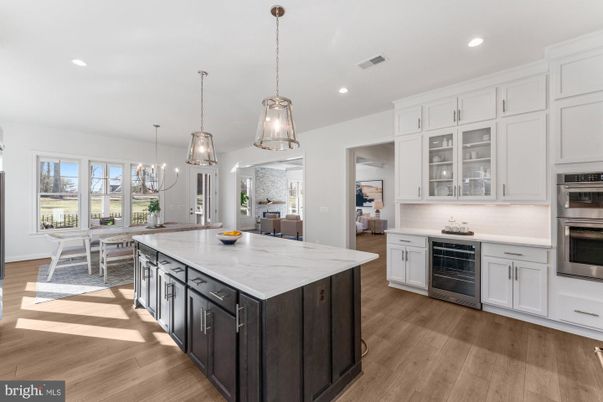 Chandelier, Dining room, Interior, Kitchen, Pendant Lights, Recessed Lighting, Stainless Steel Appliances, Wood Texture Flooring