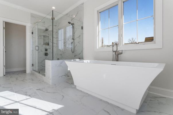 Bathroom, Free Standing Baths, Glass Shower, Interior, Marble, Marble Walls, Recessed Lighting