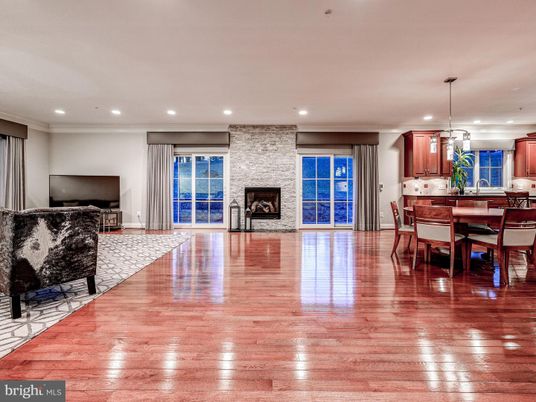 Dining room, Fireplace, Interior, Pendant Lights, Recessed Lighting, Stone Walls, Wood Texture Flooring