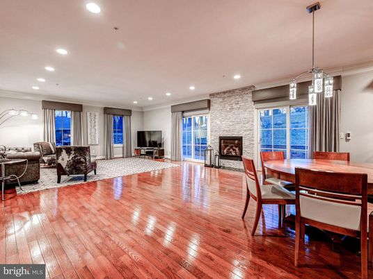 Dining room, Fireplace, Interior, Living room, Pendant Lights, Recessed Lighting, Stone Walls, Wood Texture Flooring