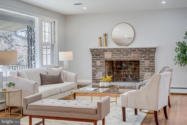 Fireplace, Interior, Living room, Recessed Lighting, Stone Walls, Wood Texture Flooring