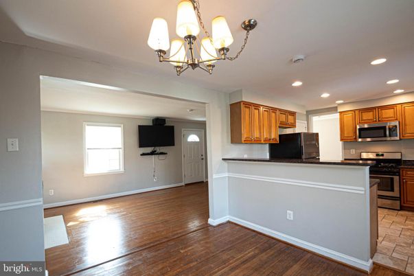 Chandelier, Interior, Kitchen, Recessed Lighting, Stainless Steel Appliances, Wood Texture Flooring