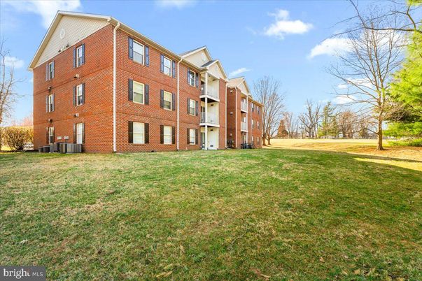 Backyard, Exterior, Facade, Brick Facade, Condo Building
