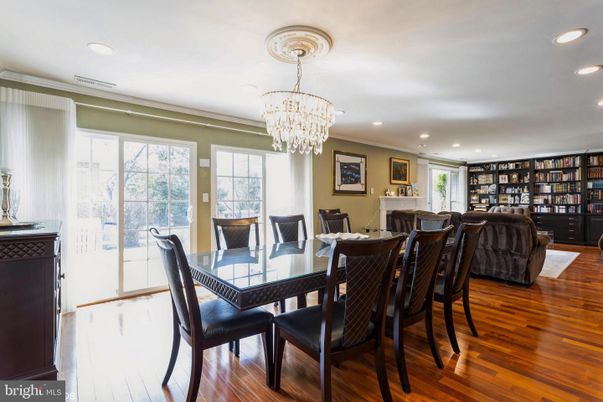 Chandelier, Dining room, Fireplace, Interior, Living room, Recessed Lighting, Wood Texture Flooring