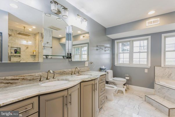 Bathroom, Dual Sink Vanities, Interior, Marble, Marble Walls, Recessed Lighting