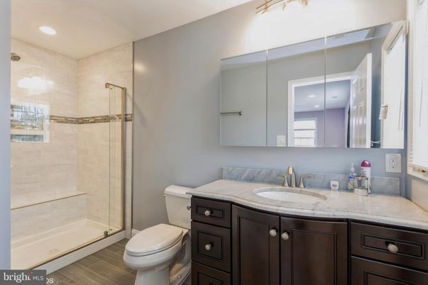 Bathroom, Glass Shower, Interior, Recessed Lighting, Wood Texture Flooring