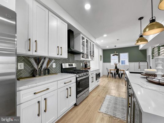 Dining room, Interior, Kitchen, Pendant Lights, Recessed Lighting, Stainless Steel Appliances, Wood Texture Flooring