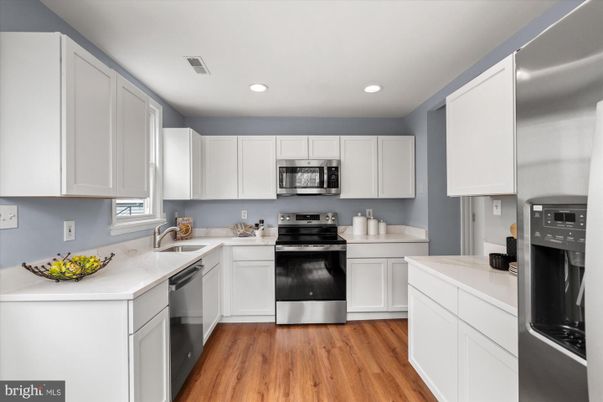 Interior, Kitchen, Recessed Lighting, Stainless Steel Appliances, Wood Texture Flooring