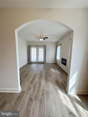 Empty room, Fireplace, Interior, Recessed Lighting, Wood Texture Flooring