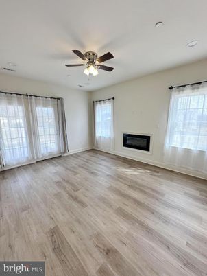 Empty room, Fireplace, Interior, Recessed Lighting, Wood Texture Flooring