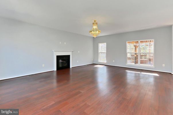 Chandelier, Empty room, Fireplace, Interior, Wood Texture Flooring