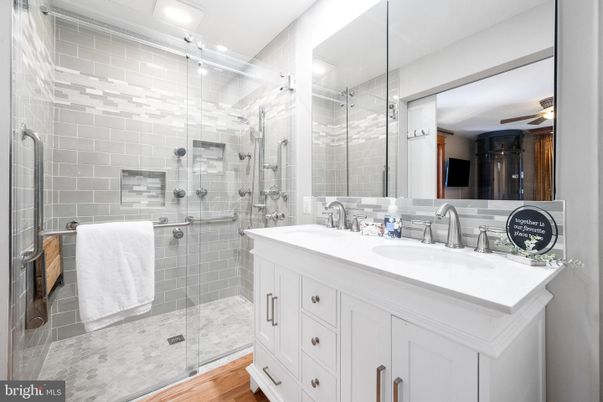Bathroom, Dual Sink Vanities, Glass Shower, Interior, Wood Texture Flooring