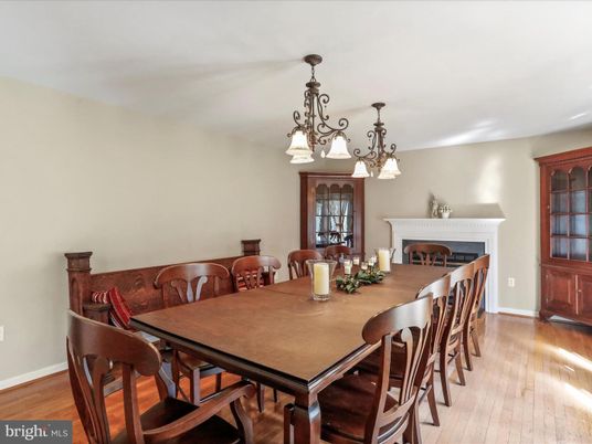 Chandelier, Dining room, Fireplace, Interior, Wood Texture Flooring