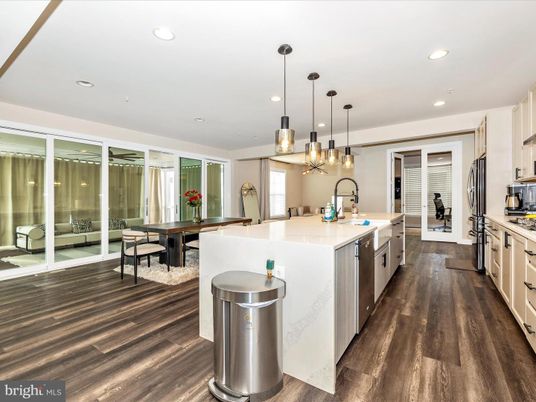 Dining room, Interior, Kitchen, Pendant Lights, Recessed Lighting, Stainless Steel Appliances, Wood Texture Flooring