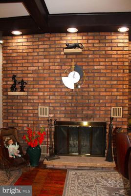 Fireplace, Interior, Recessed Lighting, Stone Walls, Wood Texture Flooring