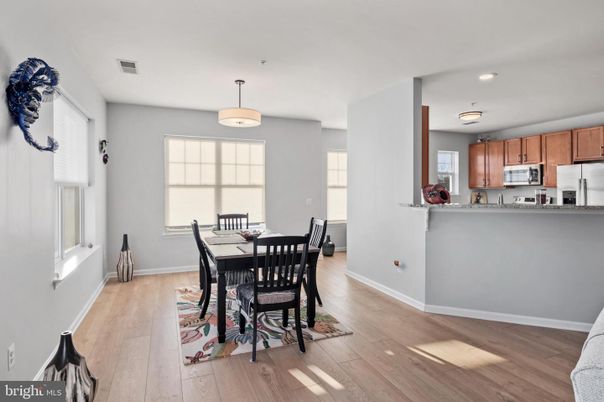 Dining room, Interior, Kitchen, Recessed Lighting, Stainless Steel Appliances, Wood Texture Flooring