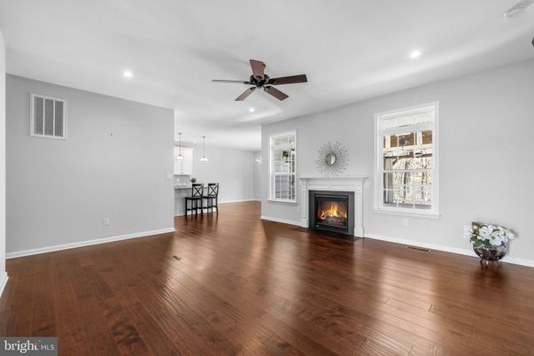 Dining room, Fireplace, Interior, Pendant Lights, Recessed Lighting, Wood Texture Flooring