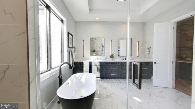 Bathroom, Dual Sink Vanities, Free Standing Baths, Interior, Marble, Marble Walls, Recessed Lighting